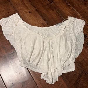 Charlotte Russe White loose fitting short sleeve shirt.